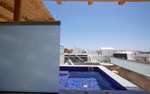Santorini: z.B. 7 Nächte im Sea Breeze Santorini Beach Resort By Hilton 5* Mitte Juni mit Frühstück und King Junior Suite mit Whirlpool